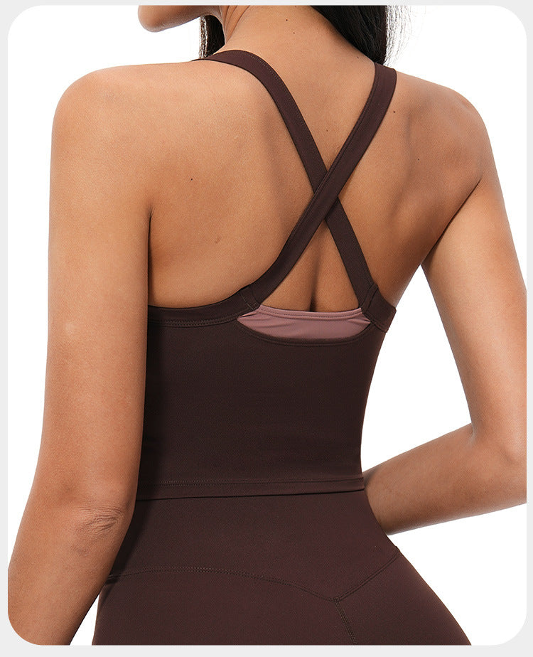 Débardeur de yoga pour femme, effet seconde peau, avec soutien-gorge de sport intégré, bloc de couleurs et dos croisé, idéal pour les activités sportives en extérieur.