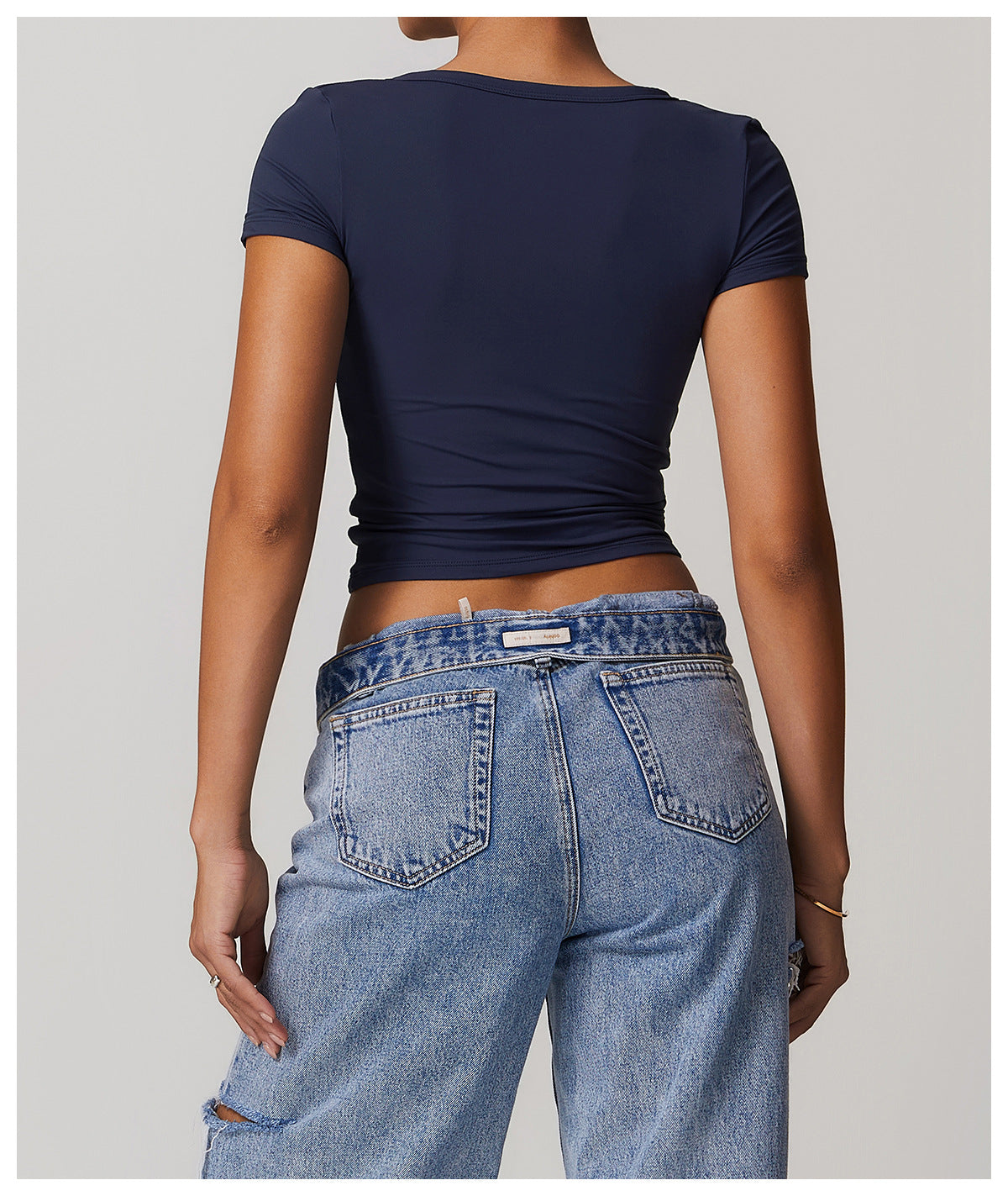 T-shirt de sport côtelé à manches courtes, col en V, pour femme, style européen et américain, idéal pour la course, le fitness et le yoga.