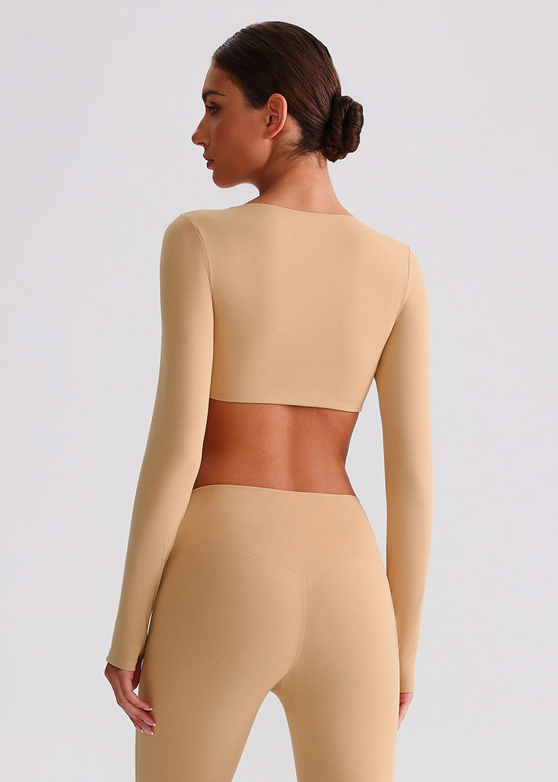 Haut de sport à manches longues dos ouvert "Seconde peau" avec soutien-gorge intégré et coupe ajustée pour la course à pied et l'entraînement