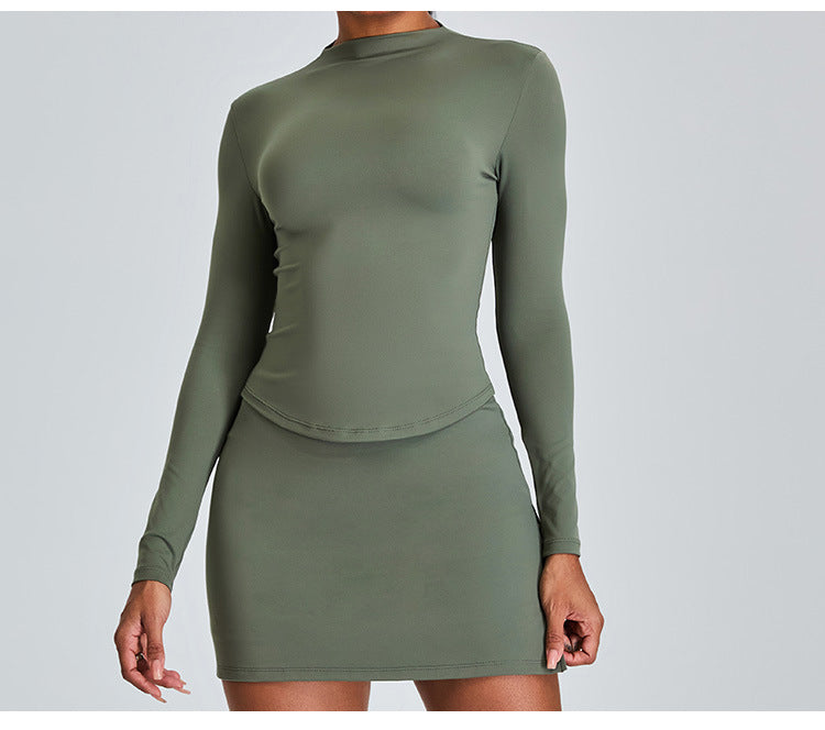 Ensemble de yoga slim à manches longues : jupe de sport trapèze taille haute avec short intégré et tenue de fitness
