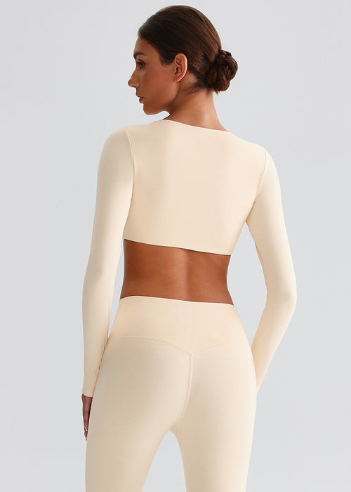 Haut de sport à manches longues dos ouvert "Seconde peau" avec soutien-gorge intégré et coupe ajustée pour la course à pied et l'entraînement