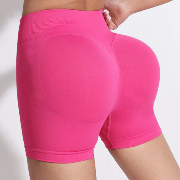 Ensemble de yoga pour femme, avec brassière de sport respirante à bretelles croisées et dos nageur, et short de fitness gainant et push-up.